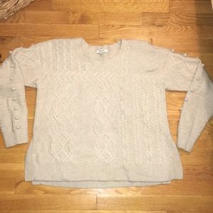 Beige Madewell sweater with fun accents